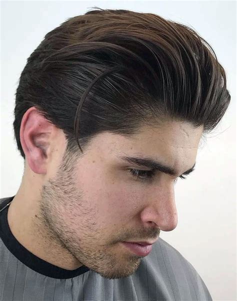 slicked back with undercut|textured slick back tapered sides.